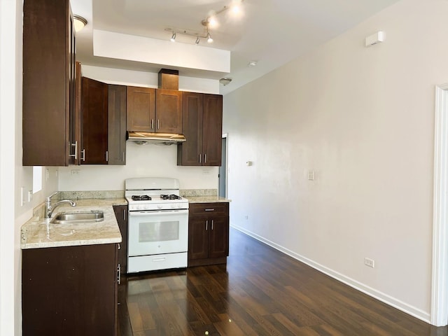 3436 S Wallace St, Chicago, IL 60616 - kitchen featuring a sink, white range with gas cooktop, dark wood-type flooring, baseboards, and under cabinet range hood