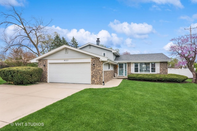 403 E Amherst St, Palatine, IL 60074 - view of front of property with driveway, a front yard, a garage, brick siding, and fence