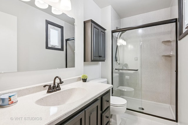 403 E Amherst St, Palatine, IL 60074 - bathroom with vanity, tile patterned floors, a stall shower, and toilet