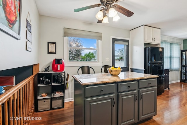 403 E Amherst St, Palatine, IL 60074 - kitchen with ceiling fan, wood finished floors, gray cabinetry, white cabinets, and freestanding refrigerator
