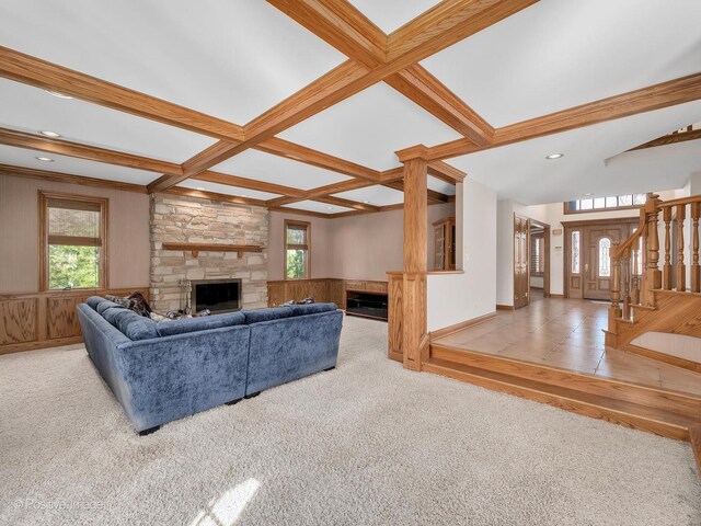 14320 Claridge Ct, Orland Park, IL 60462 - living area featuring a stone fireplace, stairway, plenty of natural light, and coffered ceiling