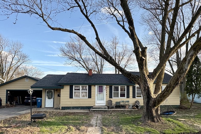 327 W Division, Amboy, IL 61310 - ranch-style home with a chimney, aphalt driveway, and roof with shingles