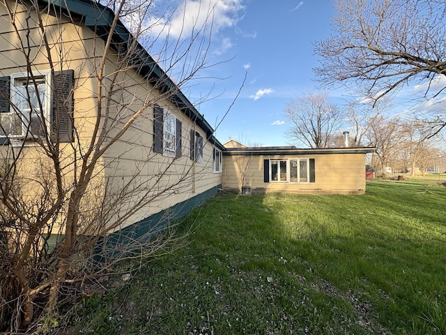 327 W Division, Amboy, IL 61310 - view of home's exterior with a yard