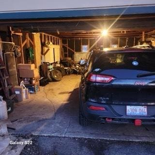 327 W Division, Amboy, IL 61310 - garage featuring a carport