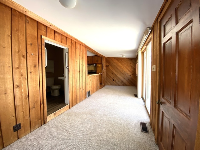 1657 Clay St, Woodstock, IL 60098 - hall with carpet and wooden walls