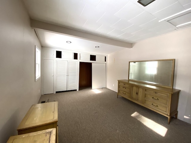 1657 Clay St, Woodstock, IL 60098 - unfurnished bedroom featuring carpet floors, beamed ceiling, a closet, and recessed lighting
