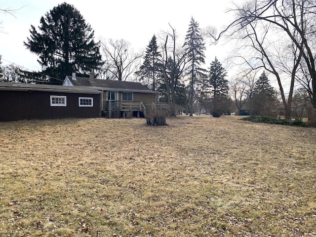 1657 Clay St, Woodstock, IL 60098 - view of yard with a deck