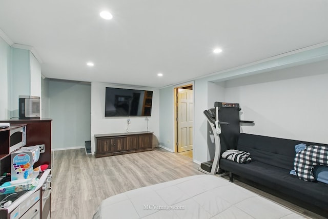 living area with recessed lighting, light wood finished floors, and baseboards