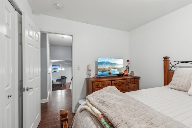 bedroom featuring wood finished floors