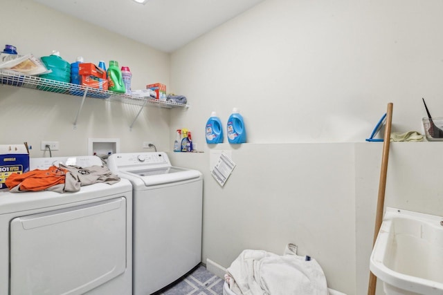 laundry area with washer and dryer
