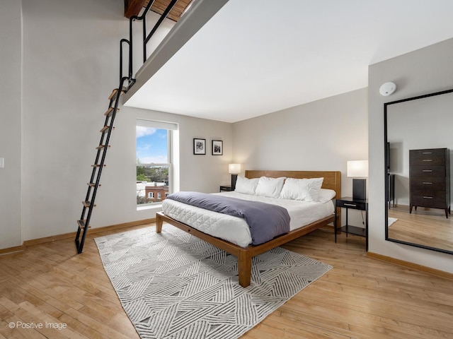 3323 N Paulina St Unit 5F, Chicago, IL 60657 - bedroom with light wood finished floors and baseboards