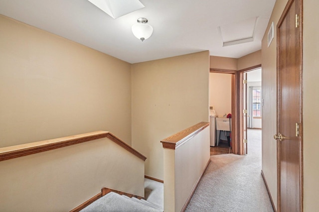 6422 W 65th St, Chicago, IL 60638 - hallway with baseboards, visible vents, carpet, and an upstairs landing