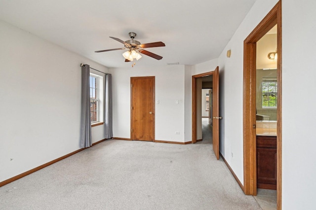6422 W 65th St, Chicago, IL 60638 - unfurnished room with a ceiling fan, light colored carpet, and a wealth of natural light