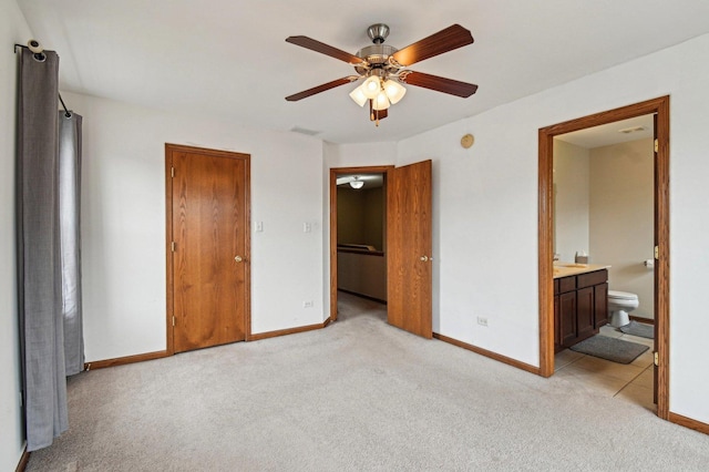 6422 W 65th St, Chicago, IL 60638 - unfurnished bedroom featuring visible vents, baseboards, ensuite bathroom, and light colored carpet