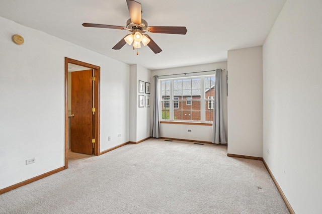 6422 W 65th St, Chicago, IL 60638 - unfurnished room featuring light colored carpet, a ceiling fan, baseboards, and visible vents
