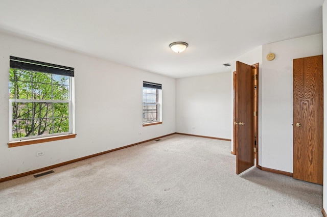 6422 W 65th St, Chicago, IL 60638 - carpeted empty room featuring baseboards and visible vents