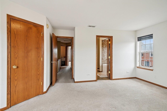 6422 W 65th St, Chicago, IL 60638 - unfurnished bedroom with light colored carpet, baseboards, and visible vents