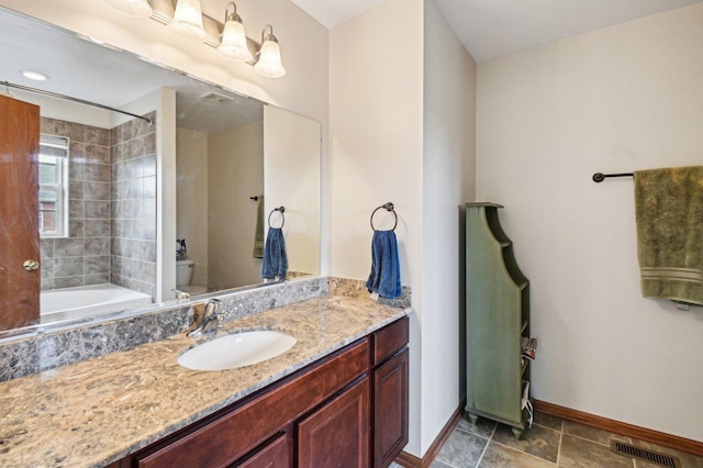 6422 W 65th St, Chicago, IL 60638 - full bathroom featuring visible vents, vanity, toilet, baseboards, and  shower combination