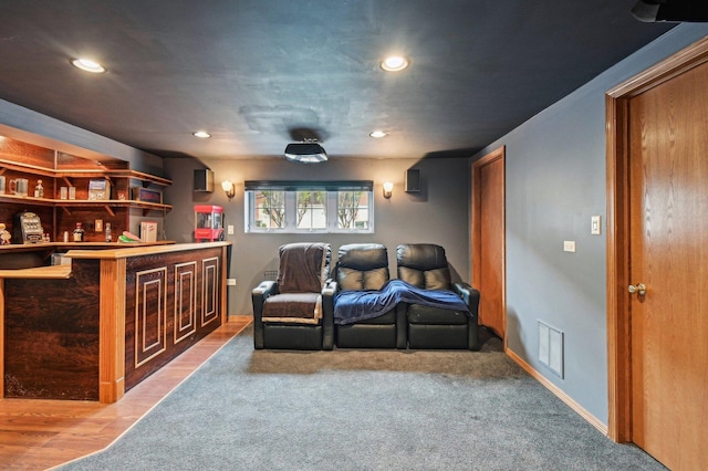 6422 W 65th St, Chicago, IL 60638 - living room featuring recessed lighting, visible vents, a dry bar, and carpet