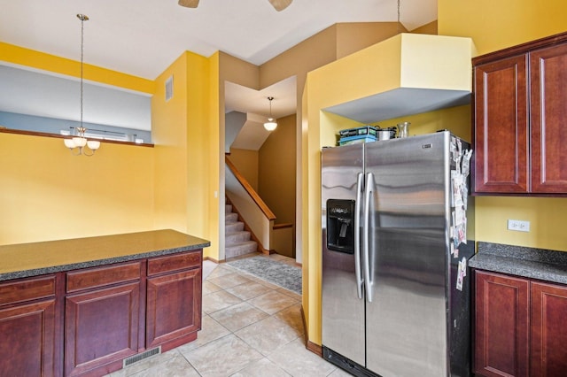 6422 W 65th St, Chicago, IL 60638 - kitchen featuring visible vents, dark brown cabinets, dark countertops, and stainless steel fridge with ice dispenser