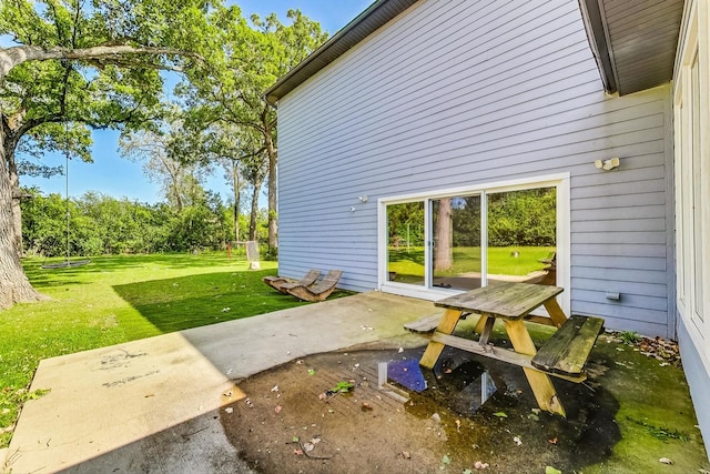 exterior space featuring a yard and a patio