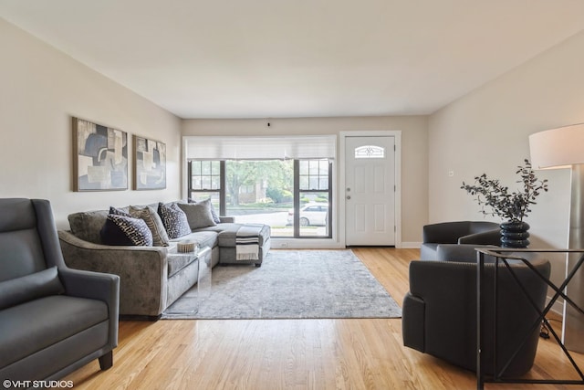 8518 S Avalon Ave, Chicago, IL 60619 - living area featuring light wood finished floors and baseboards