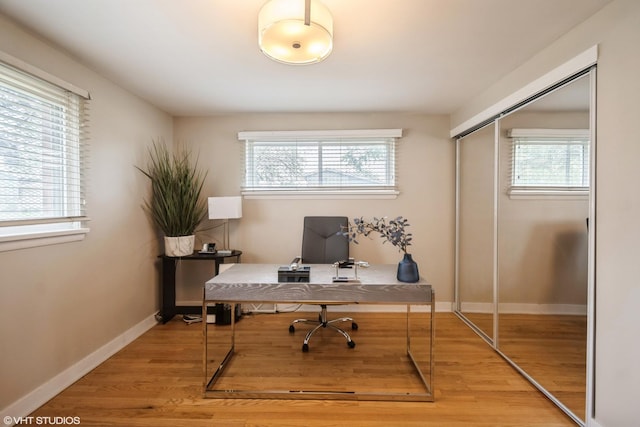 8518 S Avalon Ave, Chicago, IL 60619 - office space featuring plenty of natural light, light wood-type flooring, and baseboards