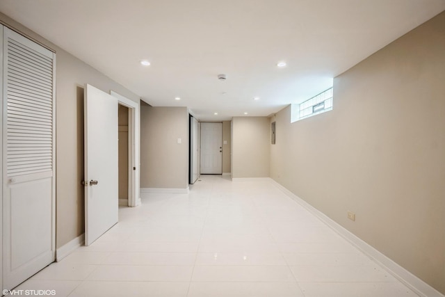 8518 S Avalon Ave, Chicago, IL 60619 - basement featuring recessed lighting, light tile patterned flooring, and baseboards