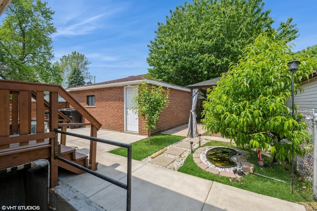 8518 S Avalon Ave, Chicago, IL 60619 - view of patio / terrace featuring an outbuilding