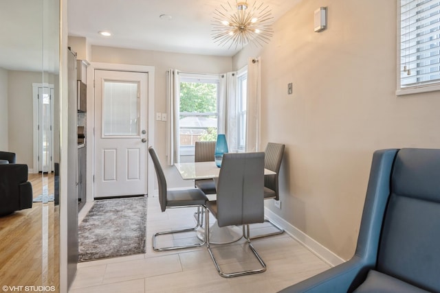 8518 S Avalon Ave, Chicago, IL 60619 - dining space with a chandelier, baseboards, recessed lighting, and tile patterned flooring