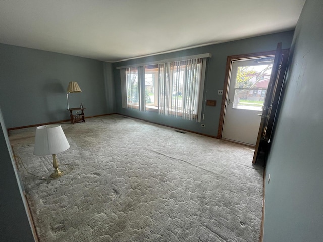 4603 Rose St, Schiller Park, IL 60176 - unfurnished living room featuring carpet and visible vents