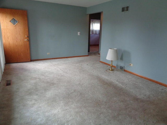 4603 Rose St, Schiller Park, IL 60176 - spare room with carpet flooring, visible vents, and baseboards