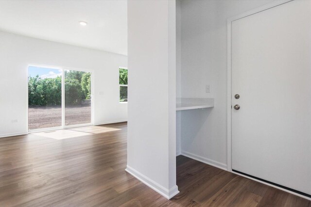 908 Fair Meadow St, North Aurora, IL 60542 - kitchen featuring appliances with stainless steel finishes, light wood finished floors, a center island, white cabinets, and recessed lighting