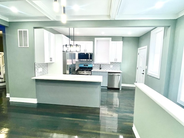 7042 S Eberhart Ave, Chicago, IL 60637 - kitchen with stainless steel appliances, decorative backsplash, light countertops, white cabinetry, and crown molding