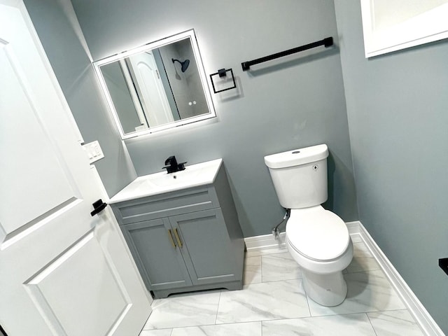 7042 S Eberhart Ave, Chicago, IL 60637 - bathroom with vanity and marble finish floors