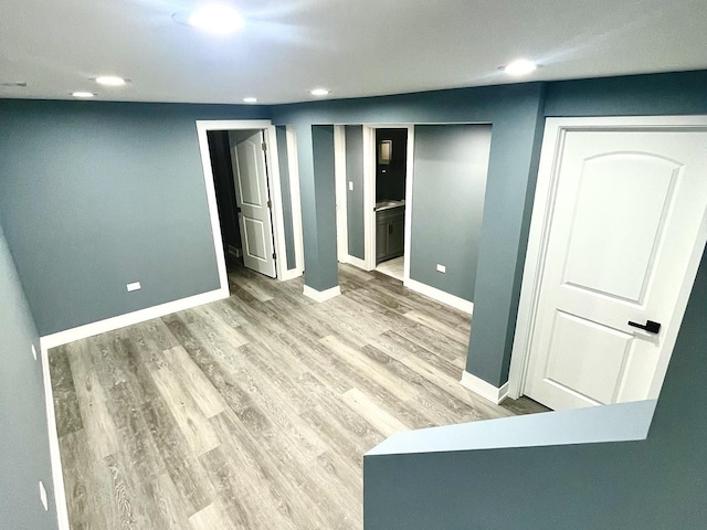 7042 S Eberhart Ave, Chicago, IL 60637 - finished basement with recessed lighting and wood finished floors