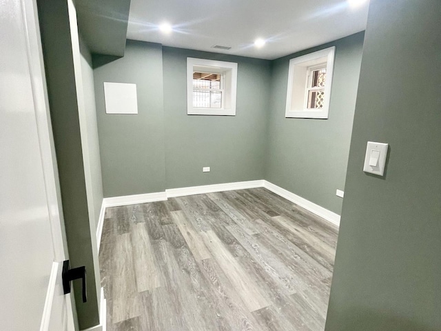 7042 S Eberhart Ave, Chicago, IL 60637 - below grade area with wood finished floors and recessed lighting