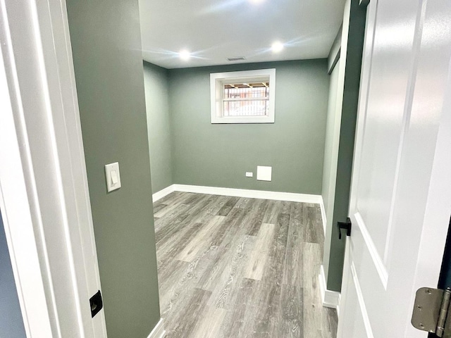 7042 S Eberhart Ave, Chicago, IL 60637 - spare room featuring wood finished floors