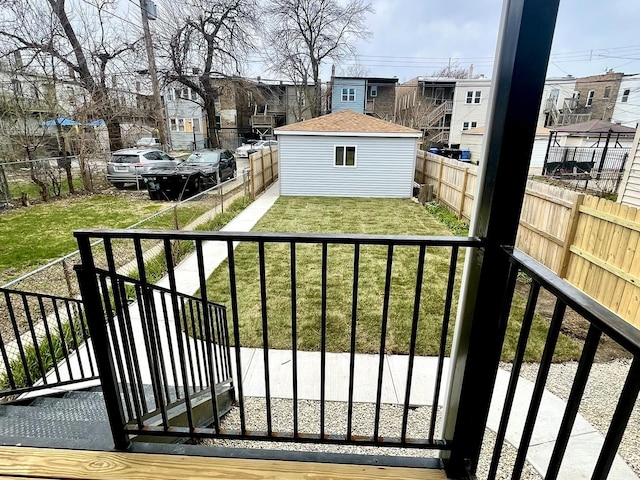 7042 S Eberhart Ave, Chicago, IL 60637 - gate featuring a fenced backyard and a residential view