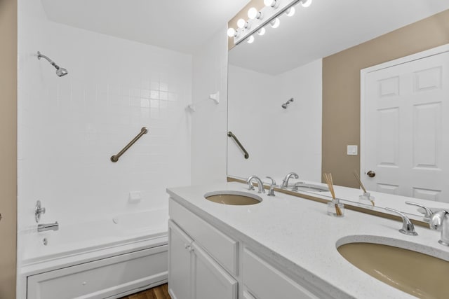 full bathroom with bathtub / shower combination and double vanity