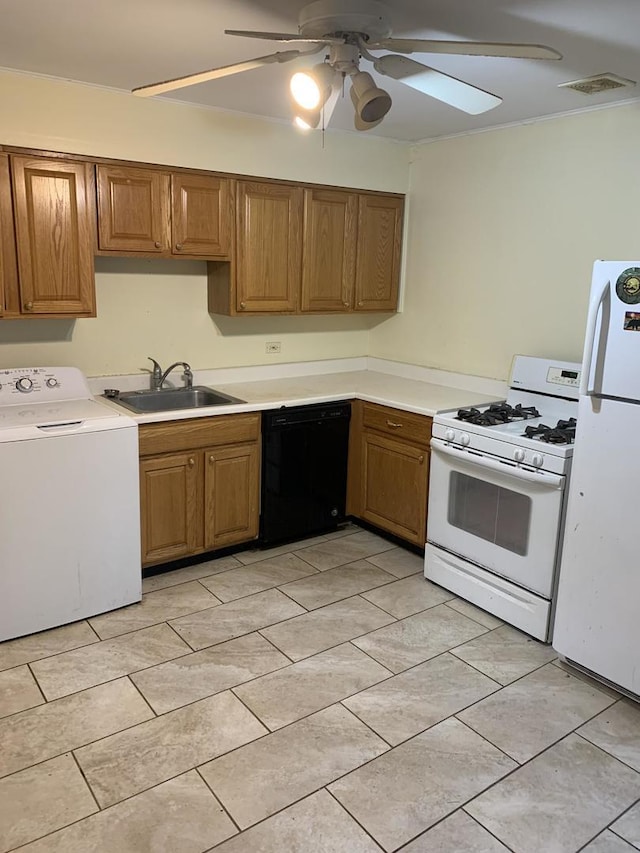 2107 Flicker Ln, Rolling Meadows, IL 60008 - kitchen with washer / dryer, white appliances, a sink, a ceiling fan, and light countertops