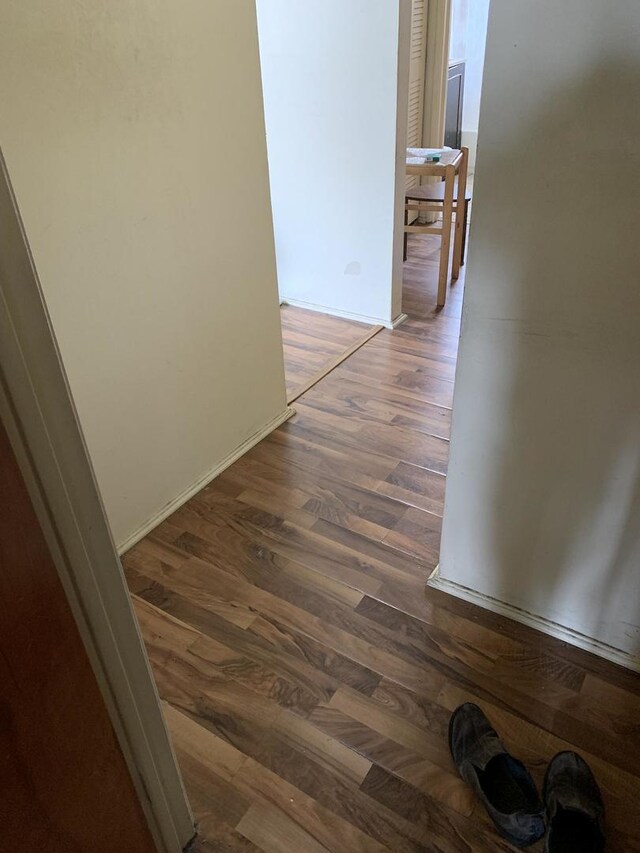 2107 Flicker Ln, Rolling Meadows, IL 60008 - corridor with wood finished floors and baseboards