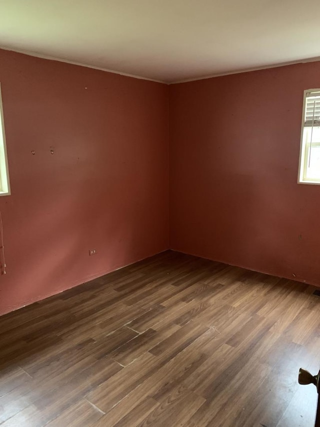 2107 Flicker Ln, Rolling Meadows, IL 60008 - spare room featuring dark wood-style floors