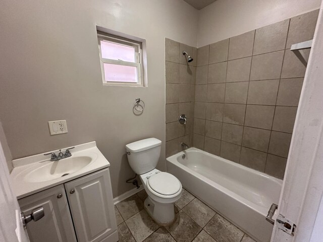 4107 W 16th St, Chicago, IL 60623 - bathroom with toilet, vanity, baseboards, and washtub / shower combination
