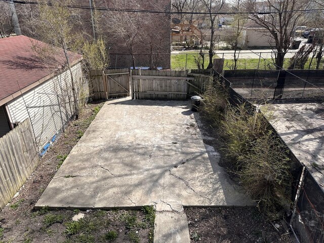4107 W 16th St, Chicago, IL 60623 - view of patio / terrace with fence and a gate