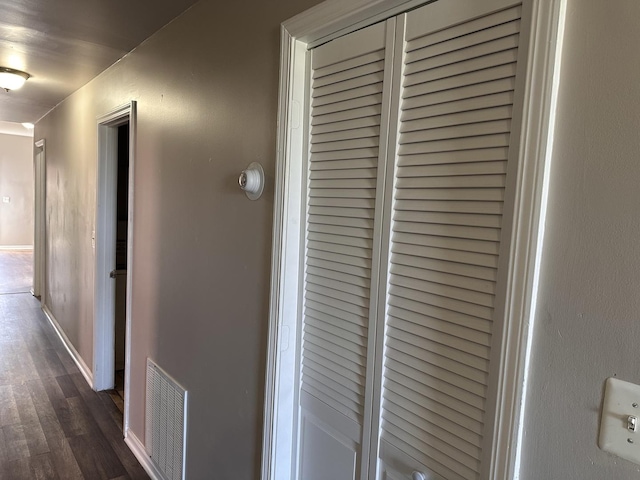 4107 W 16th St, Chicago, IL 60623 - corridor with dark wood-type flooring and baseboards