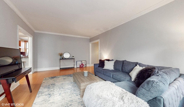 2335 N Commonwealth Ave Unit 2G, Chicago, IL 60614 - living room with baseboards, ornamental molding, and wood finished floors
