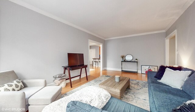 2335 N Commonwealth Ave Unit 2G, Chicago, IL 60614 - living room featuring wood finished floors, baseboards, and ornamental molding