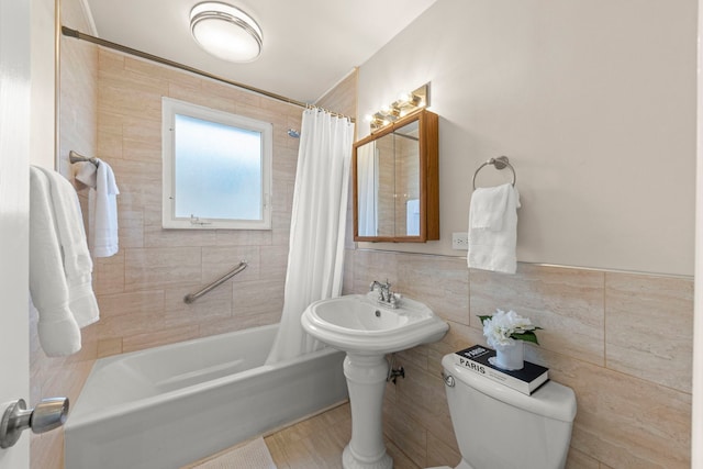 bathroom with toilet and shower / tub combo