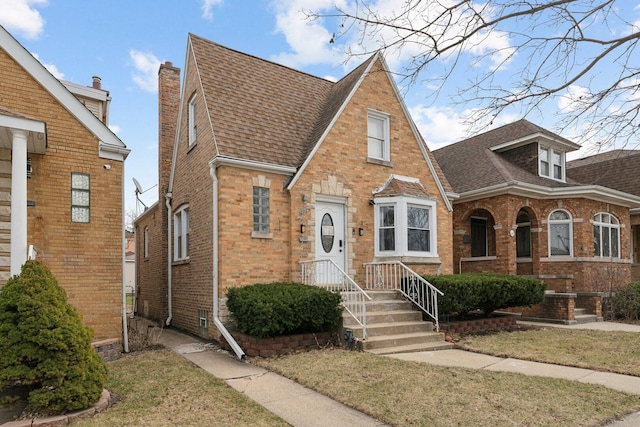 3449 N Oak Park Ave, Chicago, IL 60634 - english style home with brick siding and roof with shingles